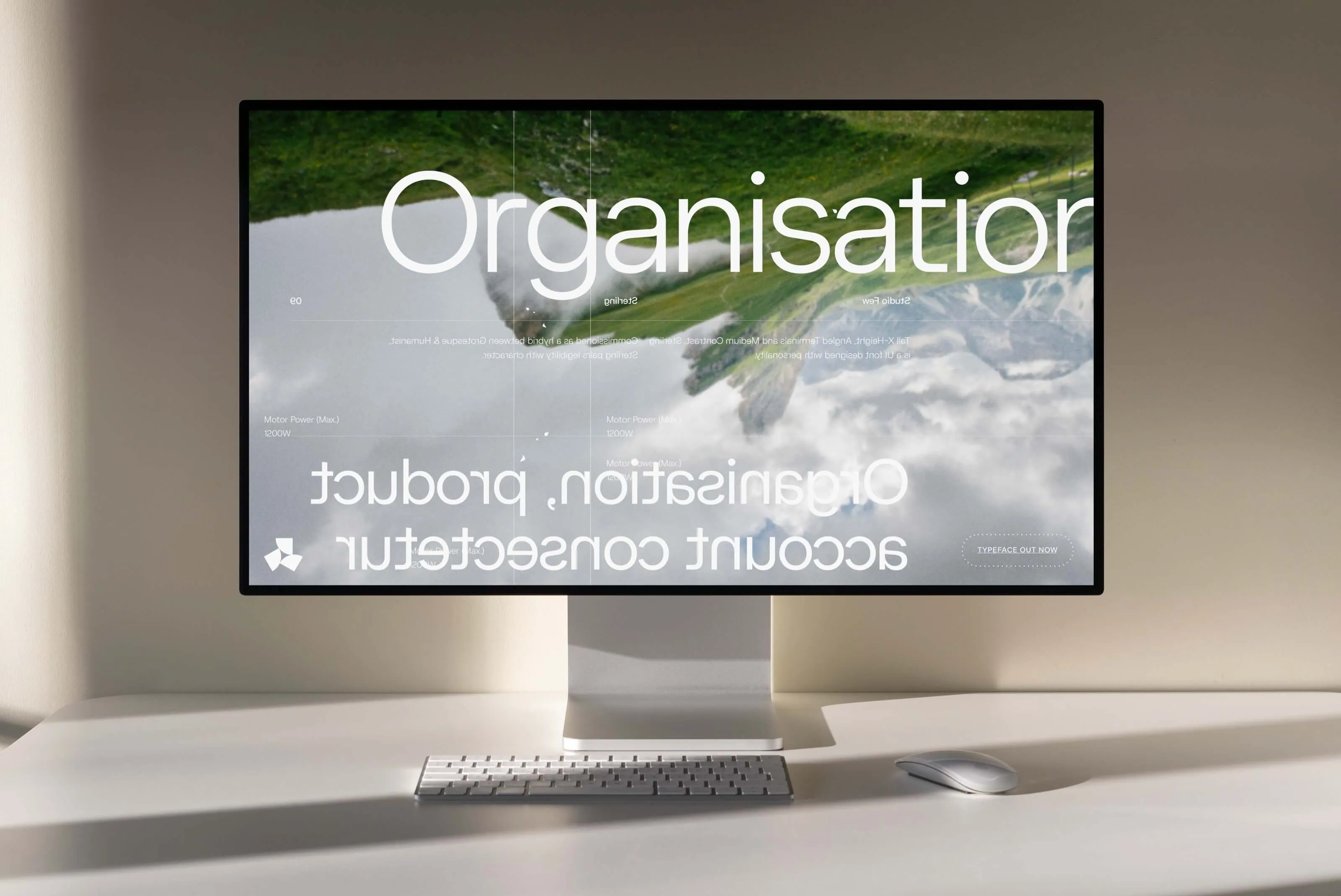 Sterling typeface on a Pro Display XDR, with 'Organisation' set large over a landscape photo