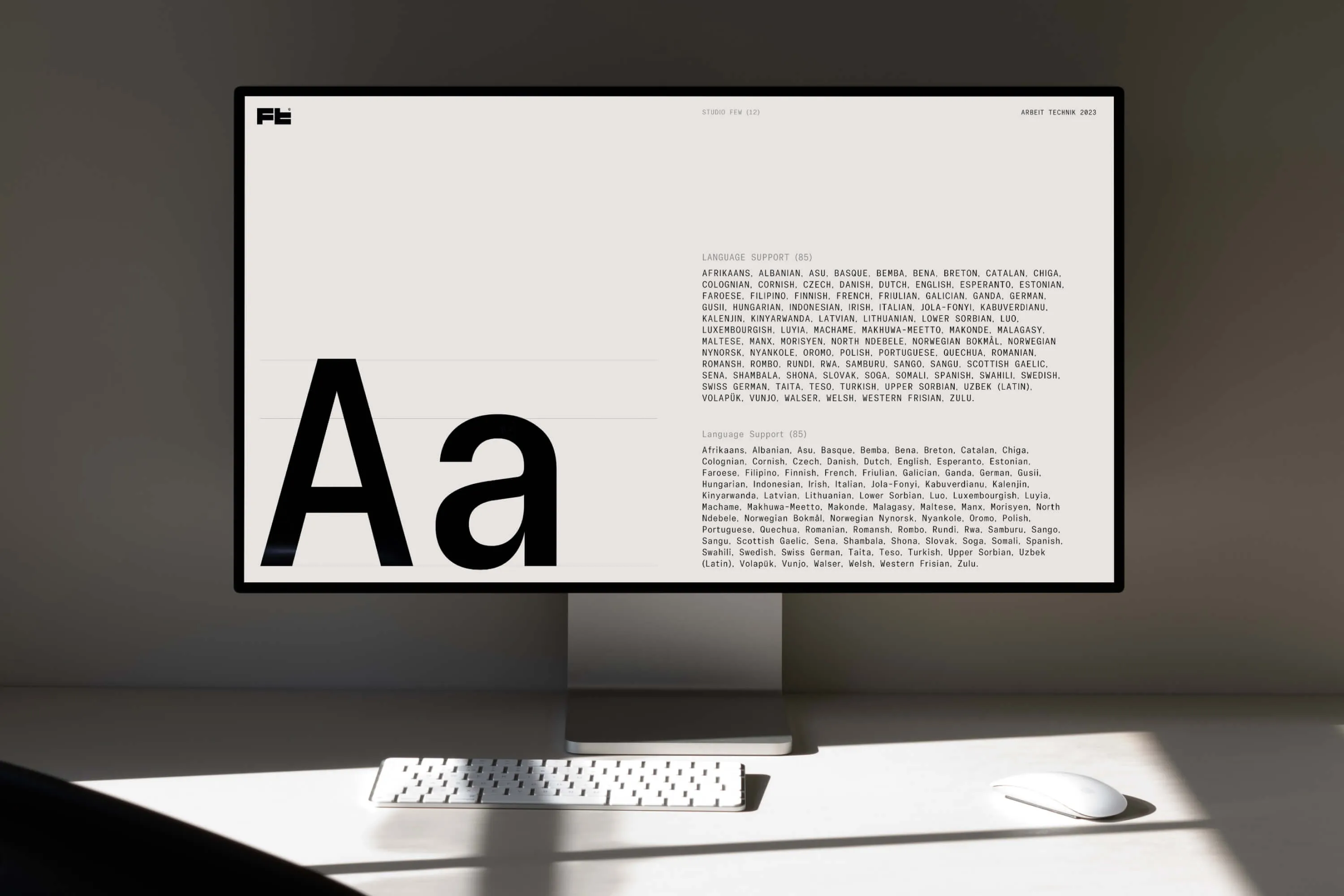 Arbeit Technik specimen on a Pro Display XDR, showing 'Aa' and the supported languages